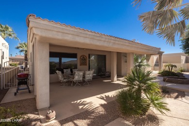 Take a look at this stunning RV garage home located in a private on London Bridge Golf Course in Arizona - for sale on GolfHomes.com, golf home, golf lot