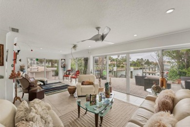 WONDERFUL FLORIDA STYLE COUNTRY CLUB SHORES canal FRONT home and on Links on Longboat Golf Club in Florida - for sale on GolfHomes.com, golf home, golf lot