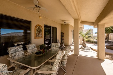 Take a look at this stunning RV garage home located in a private on London Bridge Golf Course in Arizona - for sale on GolfHomes.com, golf home, golf lot