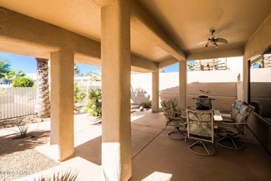 Take a look at this stunning RV garage home located in a private on London Bridge Golf Course in Arizona - for sale on GolfHomes.com, golf home, golf lot