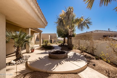 Take a look at this stunning RV garage home located in a private on London Bridge Golf Course in Arizona - for sale on GolfHomes.com, golf home, golf lot