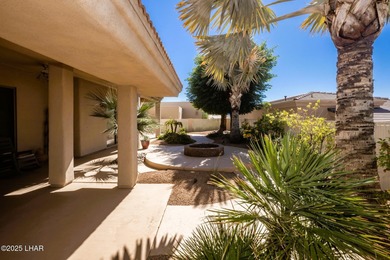 Take a look at this stunning RV garage home located in a private on London Bridge Golf Course in Arizona - for sale on GolfHomes.com, golf home, golf lot