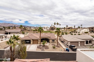 Take a look at this stunning RV garage home located in a private on London Bridge Golf Course in Arizona - for sale on GolfHomes.com, golf home, golf lot