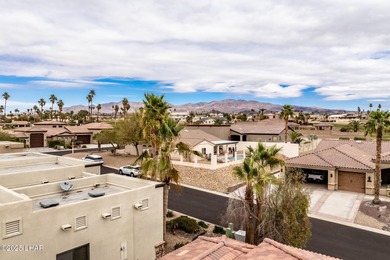 Take a look at this stunning RV garage home located in a private on London Bridge Golf Course in Arizona - for sale on GolfHomes.com, golf home, golf lot