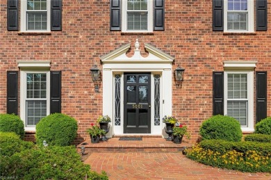 Situated on the 14th green of the newly renovated Forest Oaks on Forest Oaks Country Club in North Carolina - for sale on GolfHomes.com, golf home, golf lot