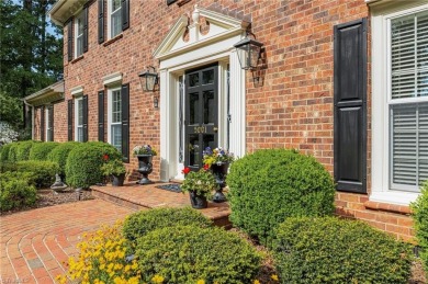 Situated on the 14th green of the newly renovated Forest Oaks on Forest Oaks Country Club in North Carolina - for sale on GolfHomes.com, golf home, golf lot