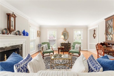 Situated on the 14th green of the newly renovated Forest Oaks on Forest Oaks Country Club in North Carolina - for sale on GolfHomes.com, golf home, golf lot