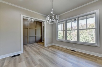 Step into refined luxury at 2881 Traditions Way in the on Traditions of Braselton Golf Club in Georgia - for sale on GolfHomes.com, golf home, golf lot