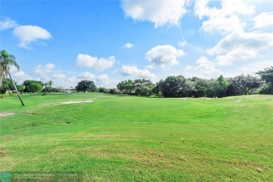 Welcome to your new home, located in the city of Tamarac! This on Woodmont Country Club in Florida - for sale on GolfHomes.com, golf home, golf lot