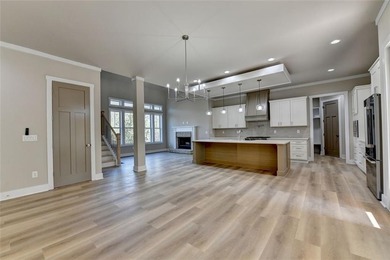 Step into refined luxury at 2881 Traditions Way in the on Traditions of Braselton Golf Club in Georgia - for sale on GolfHomes.com, golf home, golf lot