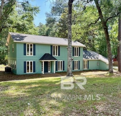 Experience exceptional Creekside living with this 4-bedroom, 2 on Lake Forest Yacht and Country Club in Alabama - for sale on GolfHomes.com, golf home, golf lot