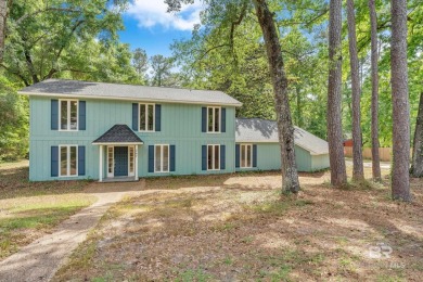 Experience exceptional Creekside living with this 4-bedroom, 2 on Lake Forest Yacht and Country Club in Alabama - for sale on GolfHomes.com, golf home, golf lot