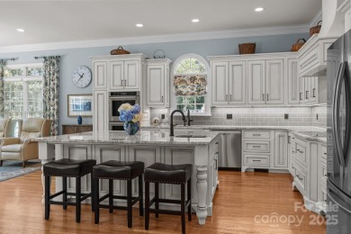 Experience refined living in this exquisite estate nestled on Old North State Club at Uwharrie Point Golf community in North Carolina - for sale on GolfHomes.com, golf home, golf lot