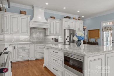 Experience refined living in this exquisite estate nestled on Old North State Club at Uwharrie Point Golf community in North Carolina - for sale on GolfHomes.com, golf home, golf lot