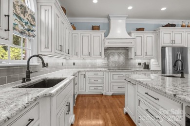 Experience refined living in this exquisite estate nestled on Old North State Club at Uwharrie Point Golf community in North Carolina - for sale on GolfHomes.com, golf home, golf lot