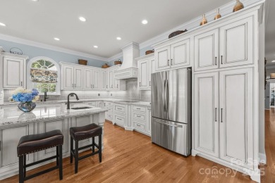 Experience refined living in this exquisite estate nestled on Old North State Club at Uwharrie Point Golf community in North Carolina - for sale on GolfHomes.com, golf home, golf lot