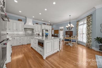 Experience refined living in this exquisite estate nestled on Old North State Club at Uwharrie Point Golf community in North Carolina - for sale on GolfHomes.com, golf home, golf lot