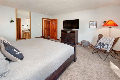 Absolutely gorgeous vistas of the Ten Mile Range from this 2 bed on The River Course At Keystone in Colorado - for sale on GolfHomes.com, golf home, golf lot