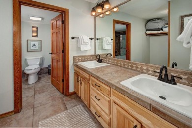 Absolutely gorgeous vistas of the Ten Mile Range from this 2 bed on The River Course At Keystone in Colorado - for sale on GolfHomes.com, golf home, golf lot