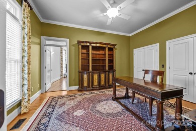 Experience refined living in this exquisite estate nestled on Old North State Club at Uwharrie Point Golf community in North Carolina - for sale on GolfHomes.com, golf home, golf lot
