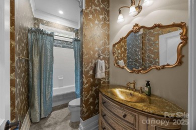 Experience refined living in this exquisite estate nestled on Old North State Club at Uwharrie Point Golf community in North Carolina - for sale on GolfHomes.com, golf home, golf lot