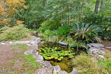 Enjoy the country club lifestyle, tree lined streets and on Porters Neck Country Club in North Carolina - for sale on GolfHomes.com, golf home, golf lot