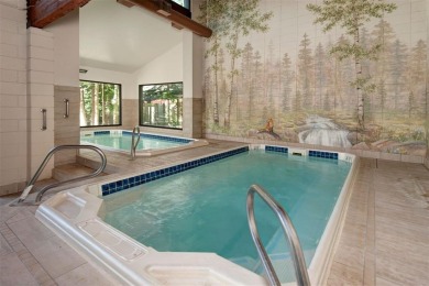 Absolutely gorgeous vistas of the Ten Mile Range from this 2 bed on The River Course At Keystone in Colorado - for sale on GolfHomes.com, golf home, golf lot