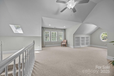 Experience refined living in this exquisite estate nestled on Old North State Club at Uwharrie Point Golf community in North Carolina - for sale on GolfHomes.com, golf home, golf lot