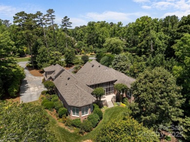 Experience refined living in this exquisite estate nestled on Old North State Club at Uwharrie Point Golf community in North Carolina - for sale on GolfHomes.com, golf home, golf lot