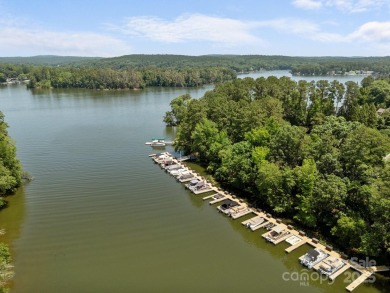 Experience refined living in this exquisite estate nestled on Old North State Club at Uwharrie Point Golf community in North Carolina - for sale on GolfHomes.com, golf home, golf lot