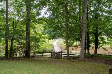 *Spectacular views of the EAGLE WATCH GOLF COURSE, tranquil POND on Canongate At Eagle Watch Golf Club in Georgia - for sale on GolfHomes.com, golf home, golf lot