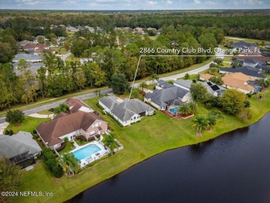 Discover luxury living in the prestigious, guard-gated Country on Country Club of Orange Park in Florida - for sale on GolfHomes.com, golf home, golf lot