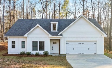 Welcome to this beautifully maintained 3-bedroom, 2-bath home on Stillwaters Golf and Country Club in Alabama - for sale on GolfHomes.com, golf home, golf lot