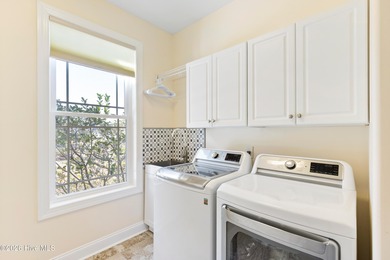 Experience the ultimate blend of luxury and comfort in this on Crow Creek Golf Club in North Carolina - for sale on GolfHomes.com, golf home, golf lot