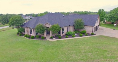 Discover this exquisitely spacious home nestled on a cul-desac on Pecan Plantation Country Club in Texas - for sale on GolfHomes.com, golf home, golf lot