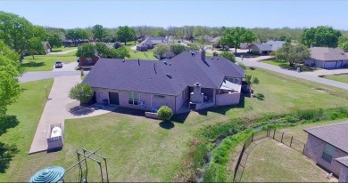 Discover this exquisitely spacious home nestled on a cul-desac on Pecan Plantation Country Club in Texas - for sale on GolfHomes.com, golf home, golf lot