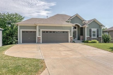 This coveted Reverse with walkout basement is ready for your on Prairie Highlands Golf Course in Kansas - for sale on GolfHomes.com, golf home, golf lot