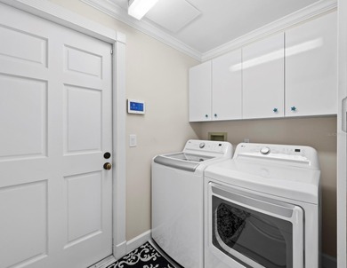 Elegant 5BR/5BA home in the gated community of Corey's Landing on Longboat Key Golf Club Resort in Florida - for sale on GolfHomes.com, golf home, golf lot