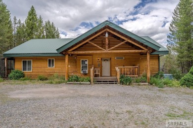 Location, location, location! Just 20 minutes from Yellowstone on Island Park Village Resort Golf Course in Idaho - for sale on GolfHomes.com, golf home, golf lot
