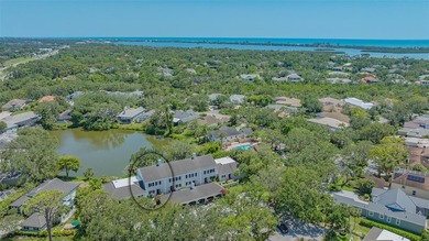 **EXPERIENCE EFFORTLESS LIVING in this BEAUTIFULLY UPDATED on The Oaks Club in Florida - for sale on GolfHomes.com, golf home, golf lot