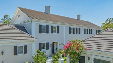 **EXPERIENCE EFFORTLESS LIVING in this BEAUTIFULLY UPDATED on The Oaks Club in Florida - for sale on GolfHomes.com, golf home, golf lot