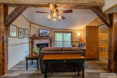 Location, location, location! Just 20 minutes from Yellowstone on Island Park Village Resort Golf Course in Idaho - for sale on GolfHomes.com, golf home, golf lot