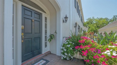 **EXPERIENCE EFFORTLESS LIVING in this BEAUTIFULLY UPDATED on The Oaks Club in Florida - for sale on GolfHomes.com, golf home, golf lot