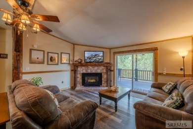 Location, location, location! Just 20 minutes from Yellowstone on Island Park Village Resort Golf Course in Idaho - for sale on GolfHomes.com, golf home, golf lot