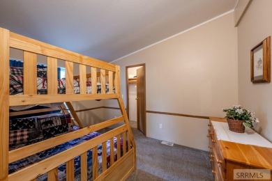 Location, location, location! Just 20 minutes from Yellowstone on Island Park Village Resort Golf Course in Idaho - for sale on GolfHomes.com, golf home, golf lot