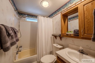 Location, location, location! Just 20 minutes from Yellowstone on Island Park Village Resort Golf Course in Idaho - for sale on GolfHomes.com, golf home, golf lot