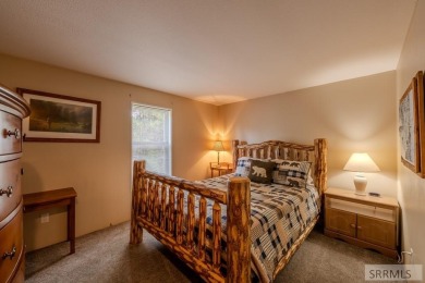 Location, location, location! Just 20 minutes from Yellowstone on Island Park Village Resort Golf Course in Idaho - for sale on GolfHomes.com, golf home, golf lot