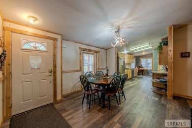 Location, location, location! Just 20 minutes from Yellowstone on Island Park Village Resort Golf Course in Idaho - for sale on GolfHomes.com, golf home, golf lot