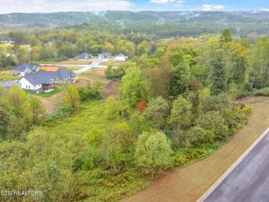 Nestled in the heart of Oak Ridge, Forest Creek Village presents on Oak Ridge Country Club in Tennessee - for sale on GolfHomes.com, golf home, golf lot