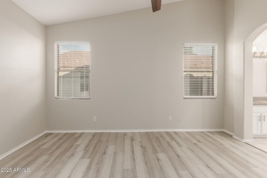 Tastefully remodeled home in Arizona Traditions 55+ guard-gated on Arizona Traditions Golf Club in Arizona - for sale on GolfHomes.com, golf home, golf lot